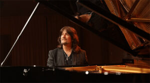 Robert Wells at the grand piano